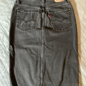 TWO Levi's denim skirts- one black, one blue